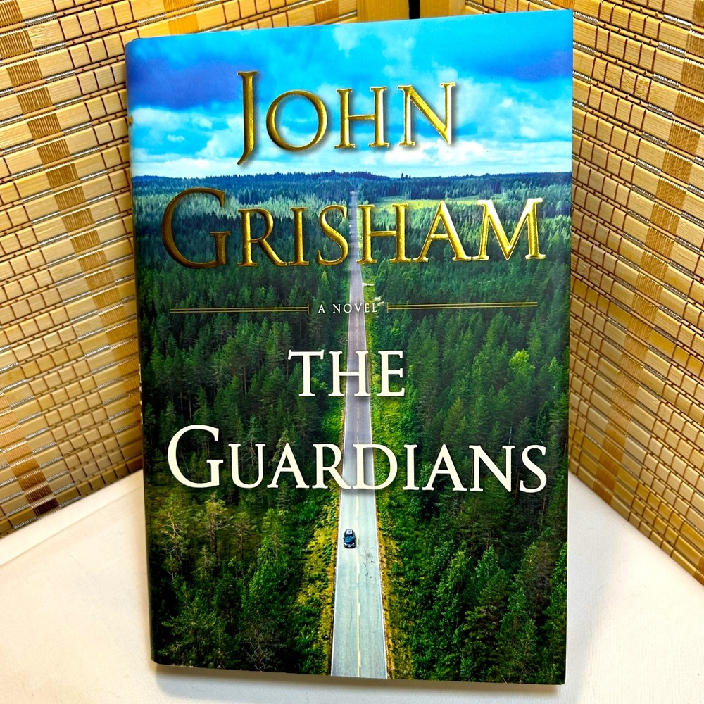 “The Guardians” Hardback Book